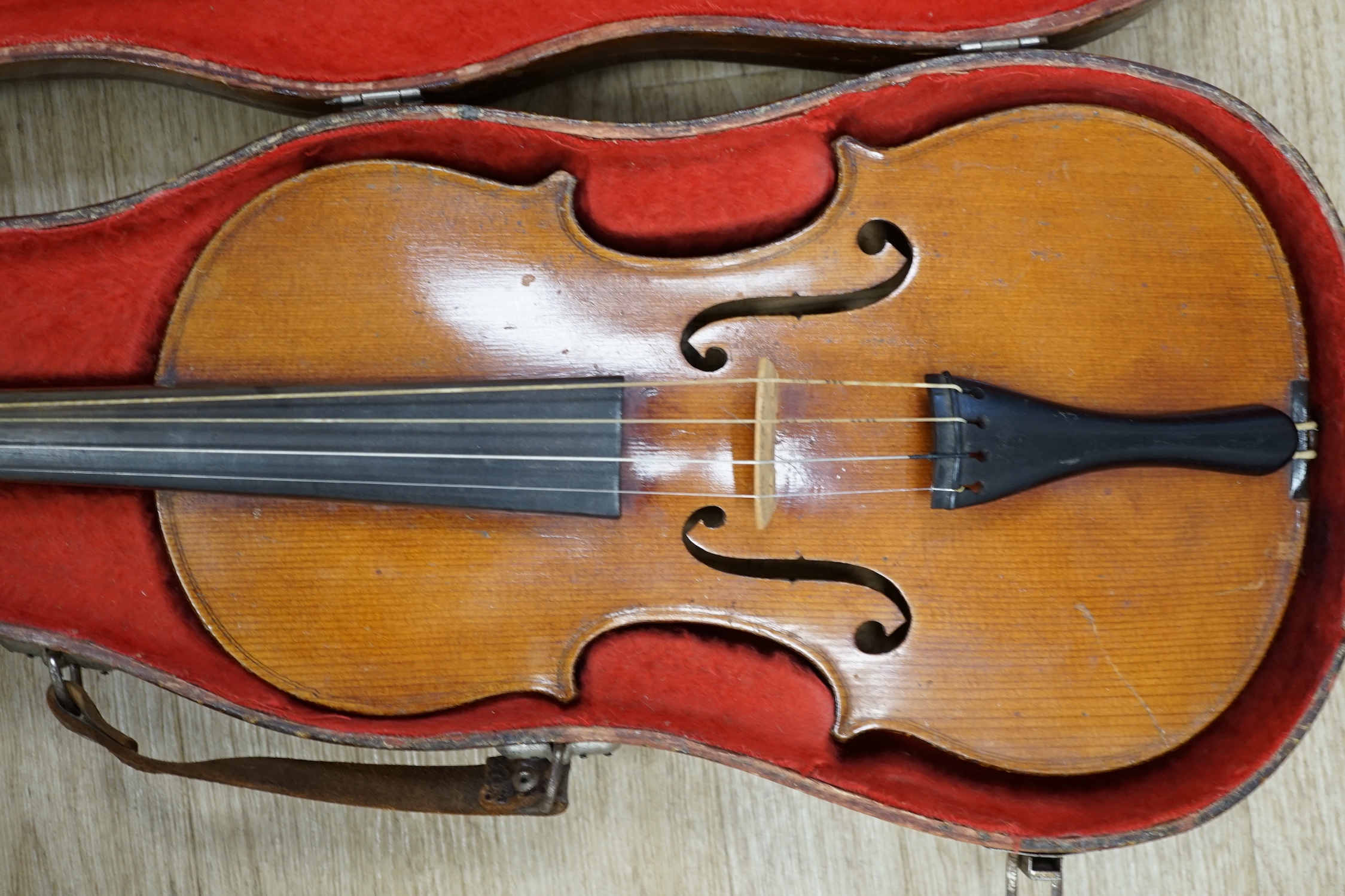 A cased early 20th century French violin and bow, label inside for Jerome Thibouville-Lamy, body length 36cm CITES Submission reference 5URFZXWK